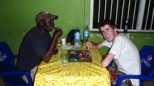 Delicious Pork dinner and home made liquor with our guide Paul after our hike